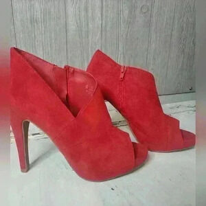 Women's Fergaliciouse red heels by Fergie. Size 7M.